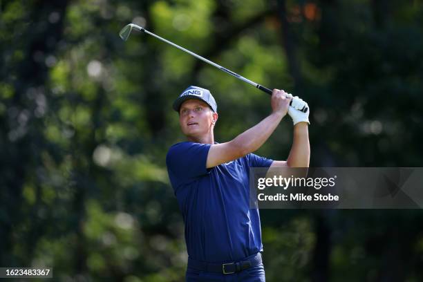 William Mouw hits his shot from the 11th tee during the second round of the Magnit Championship at Metedeconk National Golf Club on August 18, 2023...
