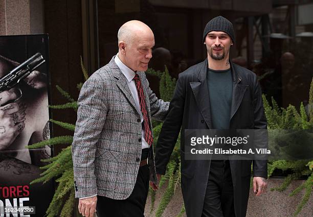 Actor John Malkovich and writer Nicolai Lilin attend 'Educazione Siberiana' photocall at Visconti Palace Hotel on February 22, 2013 in Rome, Italy.