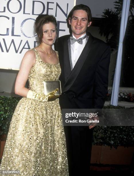 Actor Henry Thomas and guest attend the 53rd Annual Golden Globe Awards on January 21, 1996 at Beverly Hilton Hotel in Beverly Hills, California.