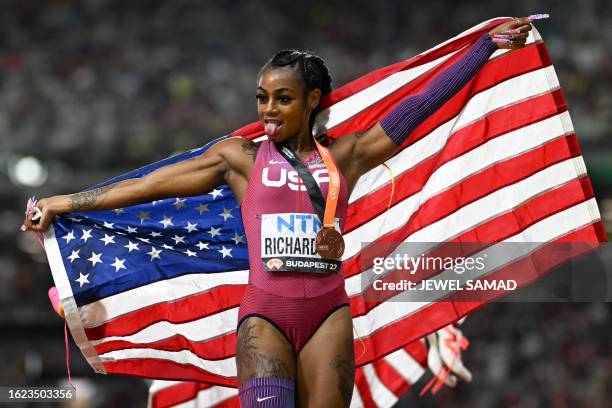 S bronze medallist Sha'Carri Richardson poses for a picture after the women's 200m final during the World Athletics Championships at the National...