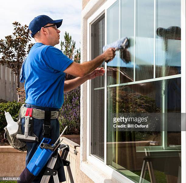 window cleaning - washing windows stock pictures, royalty-free photos & images
