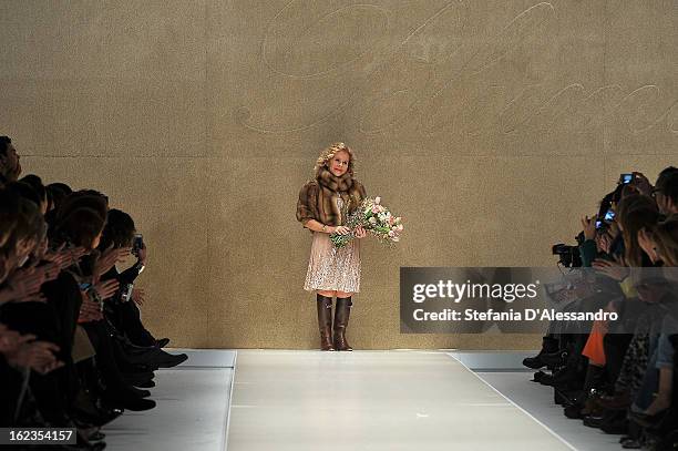 Designer Anna Molinari acknowledges the applauses after the Blumarine fashion show during Milan Fashion Week Womenswear Fall/Winter 2013/14 on...