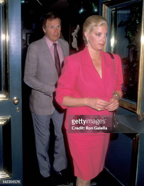 Actor Wayne Rogers and wife Amy Hirsh on March 17, 1990 dine at Jimmy's Restaurant in Beverly Hills, California.
