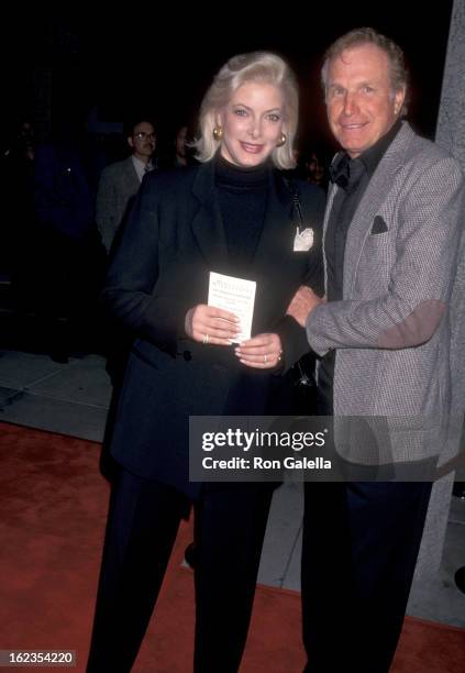Actor Wayne Rogers and wife Amy Hirsh attend the "Ghosts of Mississippi" Westwood Premiere on December 16, 1996 at Mann National Theatre in Westwood,...