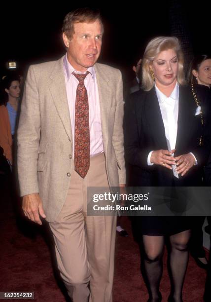 Actor Wayne Rogers and wife Amy Hirsh attend the "Indecent Proposal" Beverly Hills Premiere on April 6, 1993 at Samuel Goldwyn Theatre in Beverly...