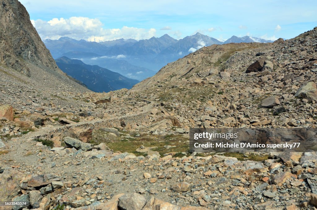 Ancient stone road in a barren alpine landscape