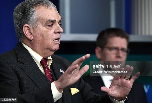 Secretary of Transportation Ray LaHood answers questions during a briefing as the White House with Press Secretary Jay Carney looks onFebruary 22,...