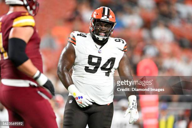 Dalvin Tomlinson of the Cleveland Browns looks on during the first half of a preseason game against the Washington Commanders at Cleveland Browns...