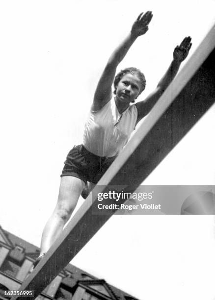 Czechoslovakian gymnast, member of a Sokol movement, training for the Berlin Summer Olympics , 1936.