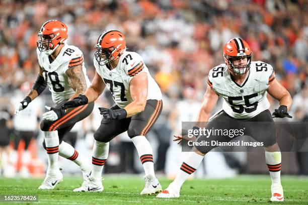 Jack Conklin, Wyatt Teller and Ethan Pocic of the Cleveland Browns in action during the first half of a preseason game against the Washington...