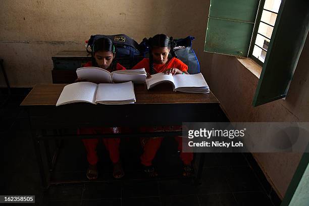 Blind students attend a lesson at the Government High School for The Blind on February 22, 2013 in Kadapa, India. The school which is funded by the...