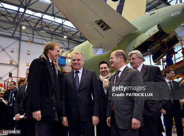 Alexander Dahm , chief of the final assembly line of the Airbus A320 family, French Prime Minister Jean-Marc Ayrault , and Hamburg's First Mayor Olaf...
