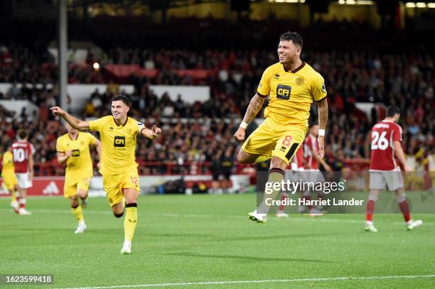 Gustavo Hamer of Sheffield United celebrates after scoring the team's first goal during the Premier League match between Nottingham Forest and...