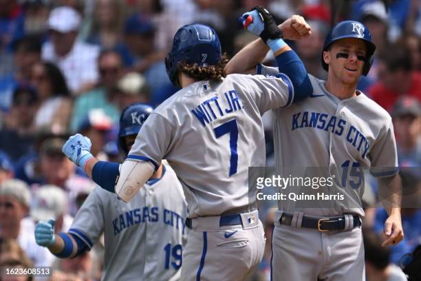 Bobby Witt Jr. #7 and Matt Duffy of the Kansas City Royals celebrate after the two-run home run in the sixth inning against the Chicago Cubs at...