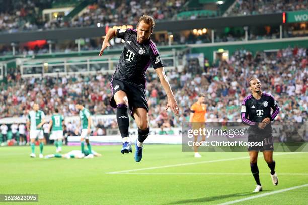 Harry Kane of Bayern Munich celebrates after scoring the team's second goal during the Bundesliga match between SV Werder Bremen and FC Bayern...