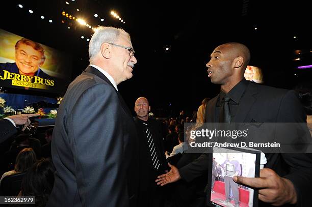 Phil Jackson and Kobe Bryant speak before the memorial service for Los Angeles Lakers Owner Dr. Jerry Buss at Nokia Theatre LA LIVE on February 21,...
