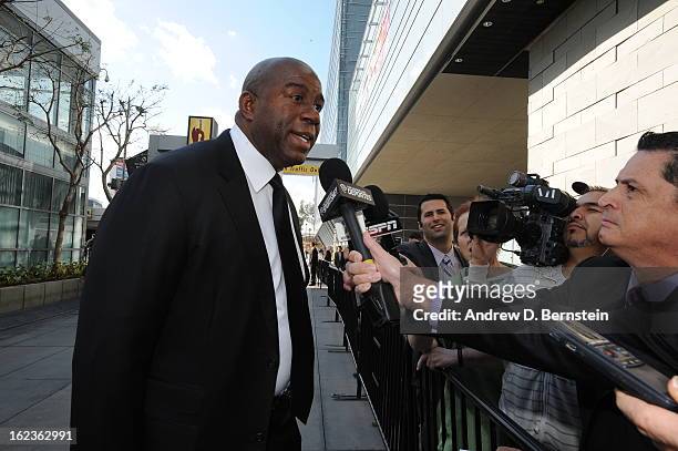 Magic Johnson speaks with the media before the memorial service for Los Angeles Lakers Owner Dr. Jerry Buss at Nokia Theatre LA LIVE on February 21,...