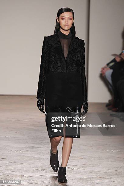 Model walks the runway at the Gabriele Colangelo fashion show during Milan Fashion Week Womenswear Fall/Winter 2013/14 on February 22, 2013 in Milan,...