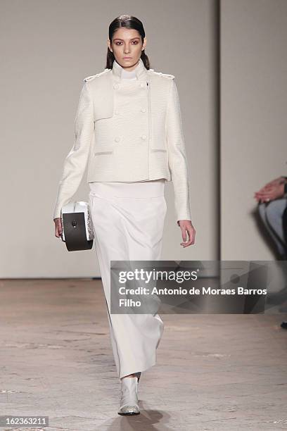 Model walks the runway at the Gabriele Colangelo fashion show during Milan Fashion Week Womenswear Fall/Winter 2013/14 on February 22, 2013 in Milan,...