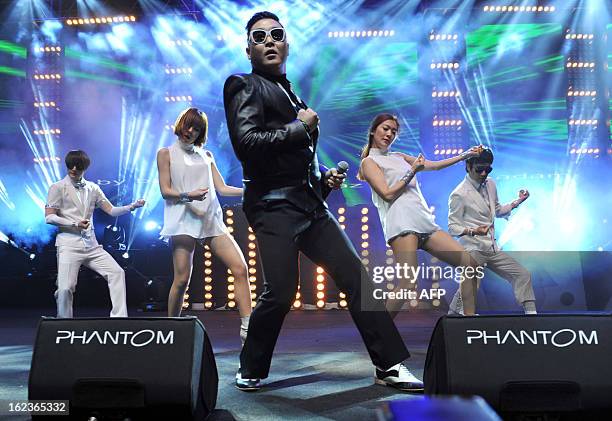 South Korean singer Psy performs his hit single "Gangnam Style" during a concert in Istanbul as part of the Istanbul Blue Night festival on February...