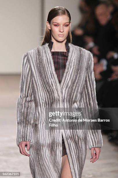 Model walks the runway at the Gabriele Colangelo fashion show during Milan Fashion Week Womenswear Fall/Winter 2013/14 on February 22, 2013 in Milan,...