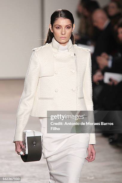 Model walks the runway at the Gabriele Colangelo fashion show during Milan Fashion Week Womenswear Fall/Winter 2013/14 on February 22, 2013 in Milan,...