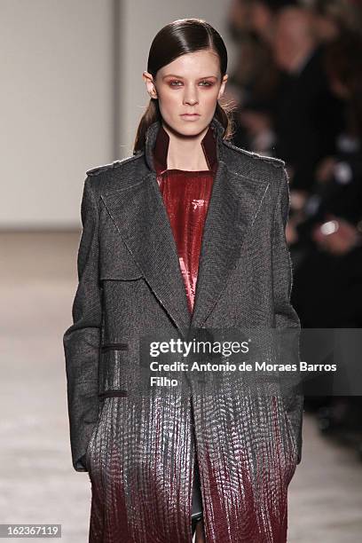 Model walks the runway at the Gabriele Colangelo fashion show during Milan Fashion Week Womenswear Fall/Winter 2013/14 on February 22, 2013 in Milan,...