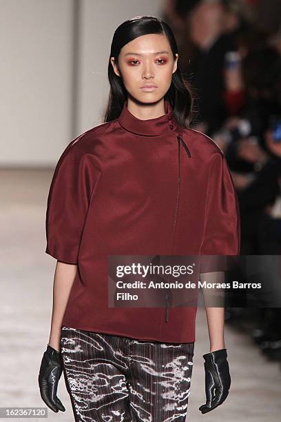 Model walks the runway at the Gabriele Colangelo fashion show during Milan Fashion Week Womenswear Fall/Winter 2013/14 on February 22, 2013 in Milan,...