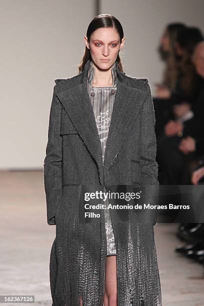 Model walks the runway at the Gabriele Colangelo fashion show during Milan Fashion Week Womenswear Fall/Winter 2013/14 on February 22, 2013 in Milan,...