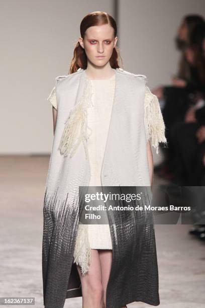 Model walks the runway at the Gabriele Colangelo fashion show during Milan Fashion Week Womenswear Fall/Winter 2013/14 on February 22, 2013 in Milan,...