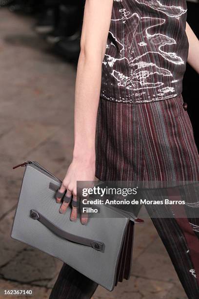 Model walks the runway at the Gabriele Colangelo fashion show during Milan Fashion Week Womenswear Fall/Winter 2013/14 on February 22, 2013 in Milan,...