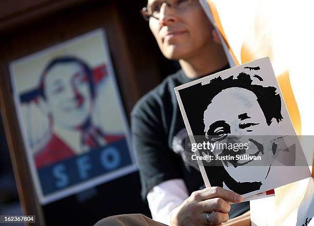 Supporter holds a sign with the image of slain San Francisco supervisor Harvey Milk during a rally at San Francisco City Hall on February 22, 2013 in...