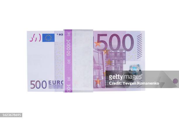 stack of 500 euro bills, isolated on white background - 500 fotografías e imágenes de stock