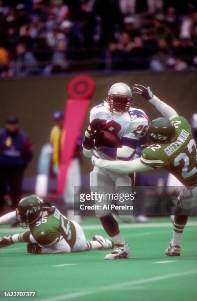 Running Back Curtis Martin of the New England Patriots has a long gain in the game between the New England Patriots vs the New York Jets at The...