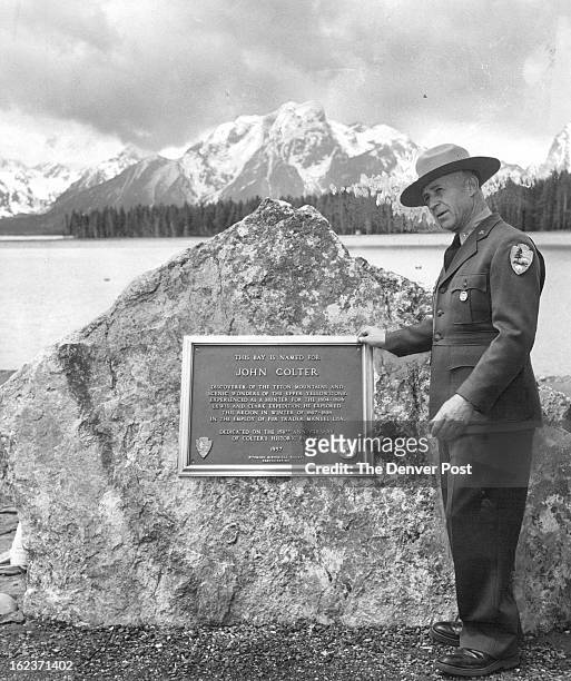 Plaque Honors Trapper; Teton Park Supt. Frank R. Oberhansley views the plaque honoring John Colter, early - day trapper who is credited with...