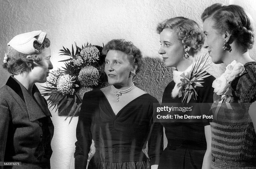 NOV 16 1954, NOV 21 1954; Mrs. Leonard Kowalski (left), guest at the wassail party last week honorin