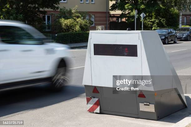 police speed camera with a fast car - radar stock-fotos und bilder