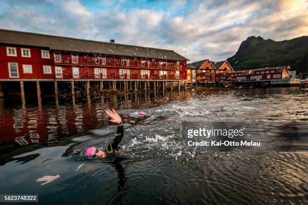 Athletes at the swim leg at The Arctic Triple - Lofoten Triathlon on August 18, 2023 in Svolvar, Norway.