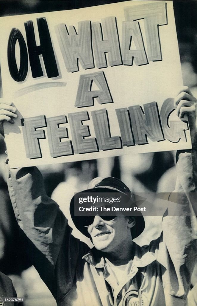 OCT 3 1984, OCT 4 1984; Special for the Denver Post--A Chicago Cubs' fan displays his pleasure with