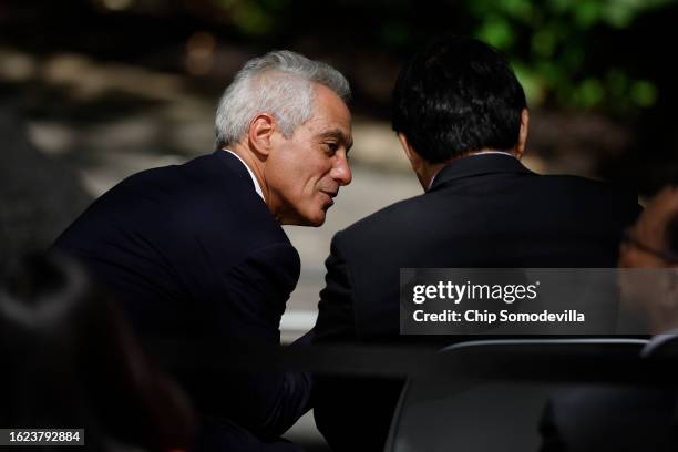 Ambassodor to Japan Rahm Emanuel talks with his counterparts following a joint news conference with President Joe Biden, Japanese Prime Minister...