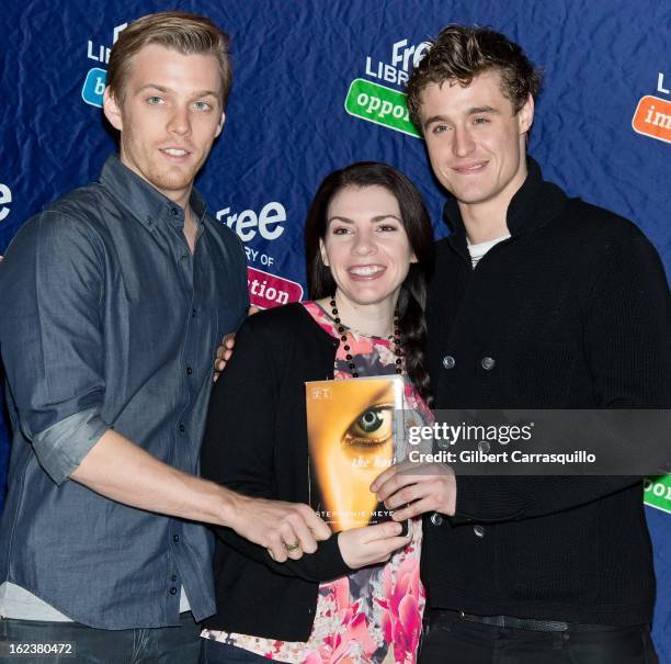 Actor Jake Abel, author Stephenie Meyer and actor Max Irons attend a book signing for "The Host" at Free Library of Philadelphia on February 22, 2013...