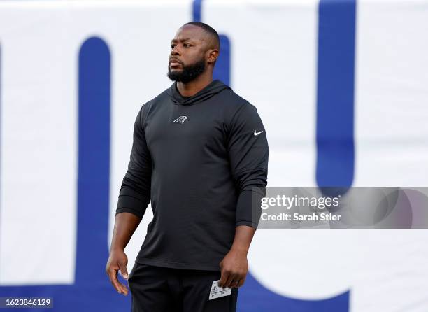 Offensive Coordinator Thomas Brown looks on during warmups before the preseason game against the New York Giants at MetLife Stadium on August 18,...