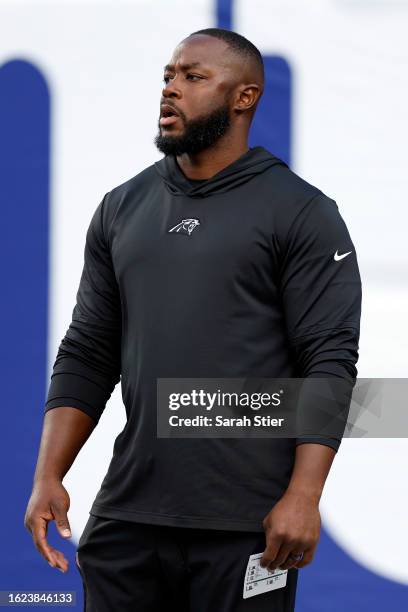 Offensive Coordinator Thomas Brown looks on during warmups before the preseason game against the New York Giants at MetLife Stadium on August 18,...