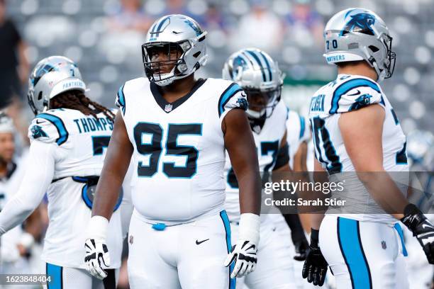 Derrick Brown of the Carolina Panthers looks on during warmups before the preseason game against the New York Giants at MetLife Stadium on August 18,...