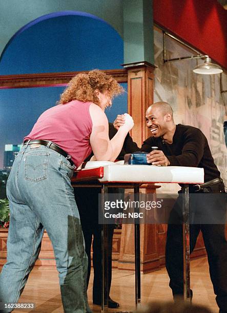 Episode 1065 -- Pictured: Athlete Dot Jones arm-wrestling Tonight Show Band leader Kevin Eubanks on January 3, 1996 --