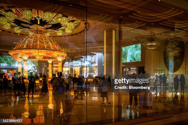 Visitors in the crystal lobby at the Galaxy Macau casino and hotel, developed by Galaxy Entertainment Group Ltd., in Macau, China, on Thursday, Aug....