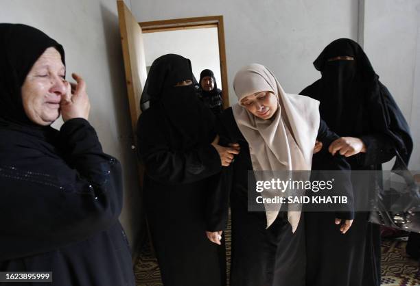 Palestinian women mourn during the funeral of Yusef Abu Zuhri in Rafah in the southern Gaza Strip on October 14, 2009. Hamas charged that Abu Zuhri,...