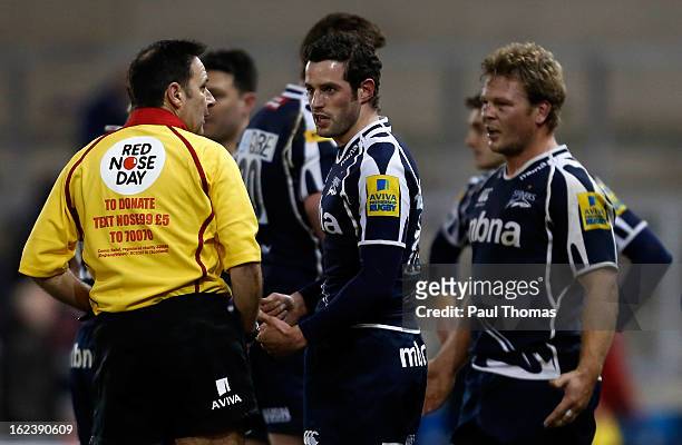Nick MacLeod and Daniel Braid of Sale have words with referee Martin Fox at full time of the Aviva Premiership match between Sale Sharks and...