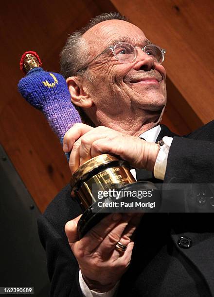 Actor Joel Grey holds his Academy Award for "Best Supporting Actor in Cabaret" at the "Cabaret" Washington DC Screening honoring Joel Grey at...