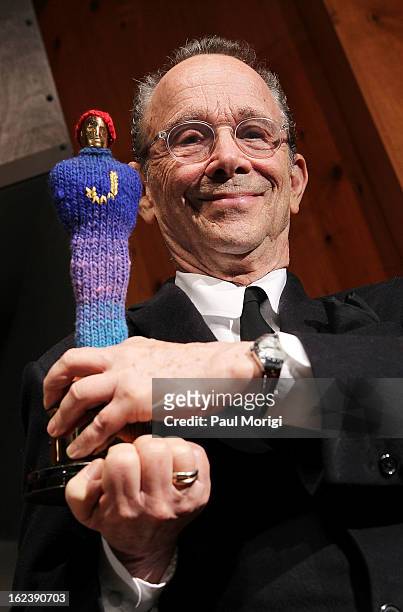 Actor Joel Grey holds his Academy Award for "Best Supporting Actor in Cabaret" at the "Cabaret" Washington DC Screening honoring Joel Grey at...